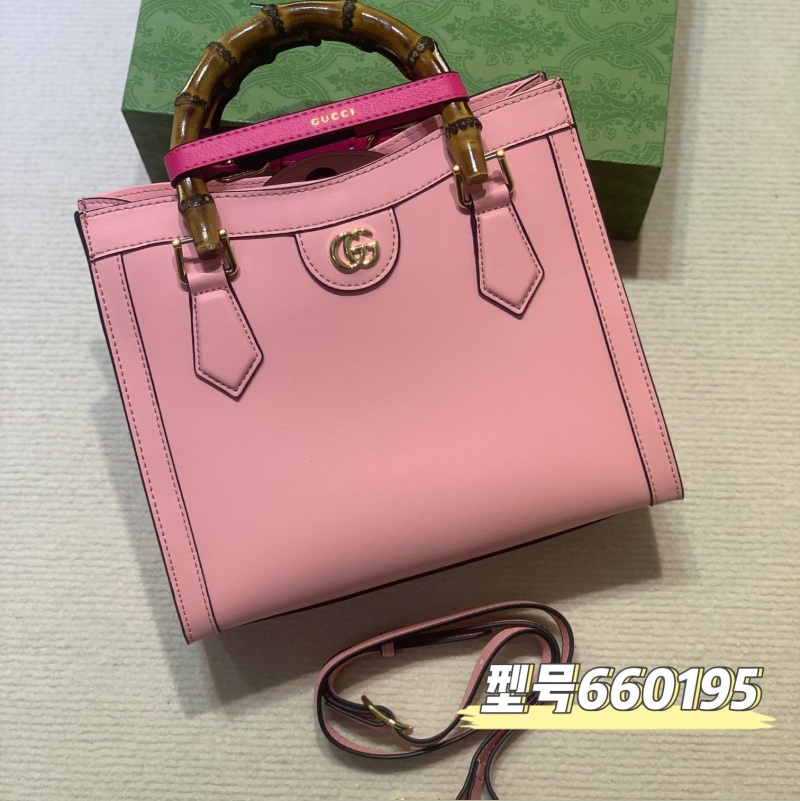 G*u*i top handle bags